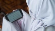هل يجوز قراءة القرآن من الجوال للحائض في رمضان لختمه