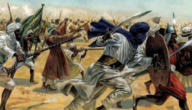 من الصحابيه التي دافعت عن النبي صلي الله عليه وسلم في غزوة احد ؟ اذكر اسمها وام. من؟